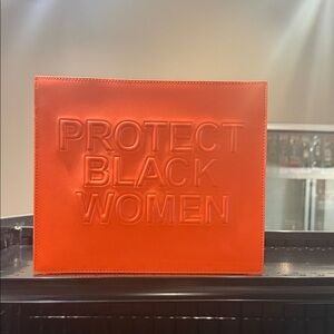 Orange Statement Clutch